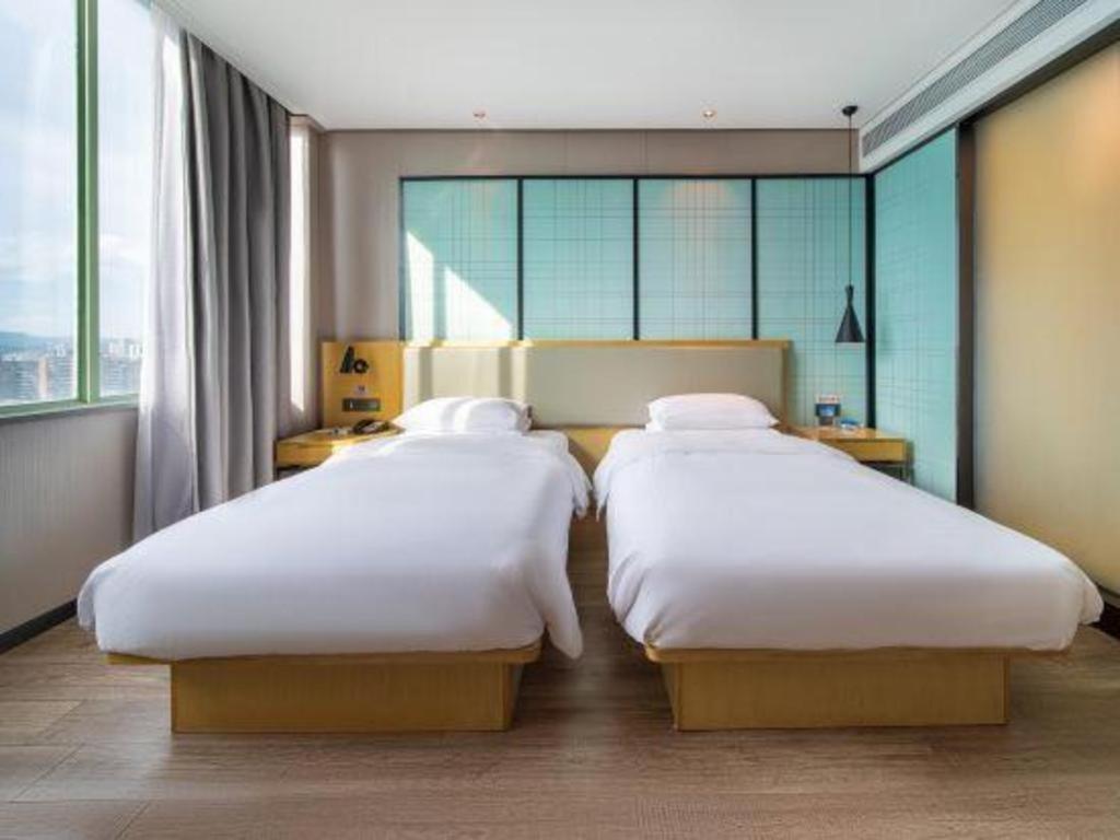Echarm Hotel Yangjiang Baili Plaza Eksteriør billede