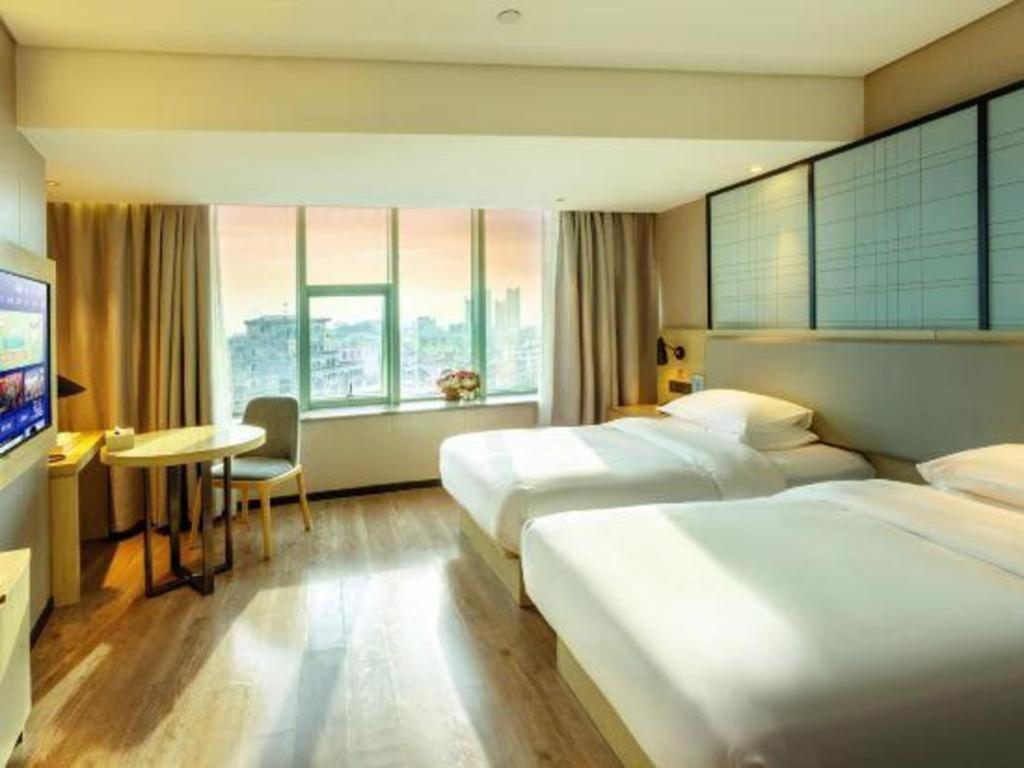 Echarm Hotel Yangjiang Baili Plaza Eksteriør billede
